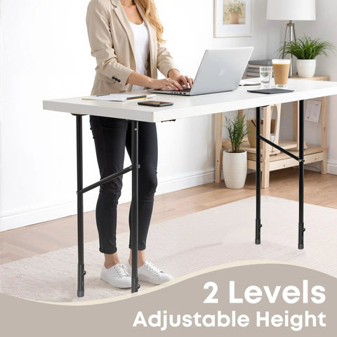 Woman using a laptop at a table with Four Pack Legit Heavy Duty Table Leg Extenders Adjustable Risers for height adjustment.