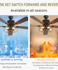 Stunning 52 Inch Retro Industrial Ceiling Fan Featuring Vintage Caged Shades And Five Reversible Solid Wood Blades With Slick Remote Controlled LED Light Kit For A Total Home Glow Up demonstrating airflow direction for summer and winter.