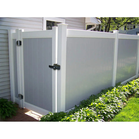 Dual Sided Lockable Magnetic Gate Latch Matte Black Zero Hassle Mounting On Wood Metal Vinyl Fence Posts on a gray vinyl fence.