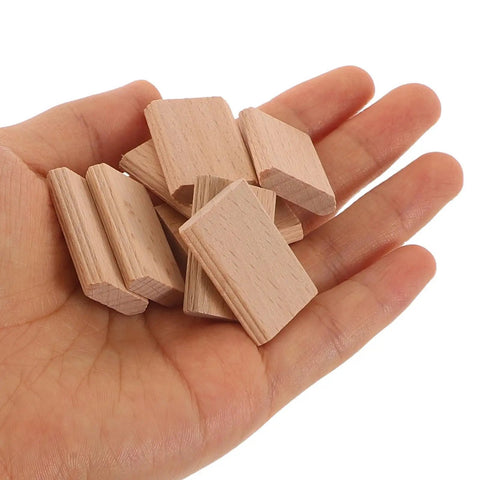 Wood Biscuit Alternative Tenons For Cabinet Making, Pro Grade Joinery Kit, 100 Pcs Brown Solid Wood Connectors For Easy, Accurate Fit And Smooth Installation In Furniture Assembly, in hand