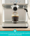 Pro Level 20 Bar Espresso Maker With Rapid Flashheat Brewing Fast Steam Wand For Silky Milk Drinks Zero Fuss Countertop Coffee Setup brewing espresso into a glass.