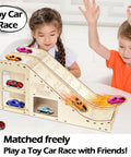 Children playing with Wooden Toy Car Jump Ramp and Race Track Set for Hot Wheels and Diecast Cars, Sturdy Plywood Jump Ramp With Storage Box