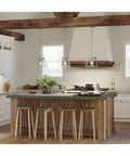 Briarwood Collection One Light Coastal Mini Pendant With Faux Wood Look Enclosure In Graphite Black Finish above kitchen island.