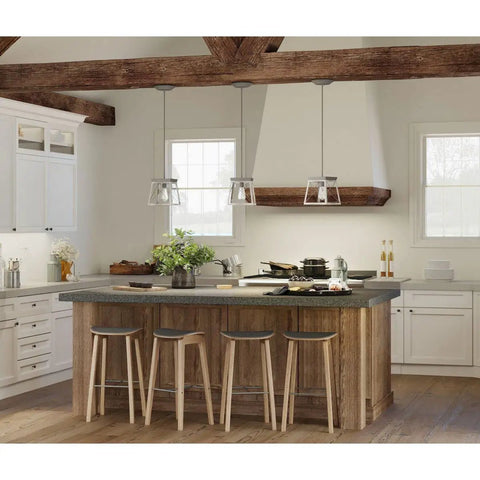 Briarwood Collection One Light Coastal Mini Pendant With Faux Wood Look Enclosure In Graphite Black Finish above kitchen island.