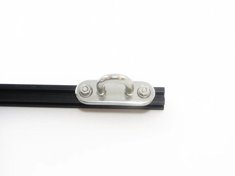 Beefy Stainless Steel Eye Plates For Aluminum Extrusion Frames mounted on black aluminum track, showing hardware attachment.