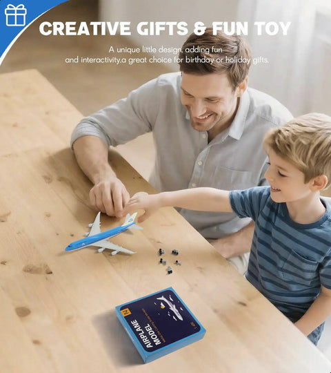 Father and son playing with 1/400 KLM 747 model plane on table, includes stand, resin fuselage, die-cast tail and belly.