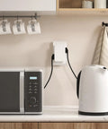 Side Entry Outlet Extender With Six Grounded Sockets 2 Pack Turns Two Outlets Into Six For Tight Spaces Behind Furniture And Desks UL Listed Wall Tap Power Splitter No Screws Needed Easy Plug In with cords plugged in.