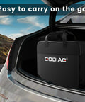 Portable J1772 EV Charger With 20Ft Cable For Level 1 And Level 2 Charging ETL Certified stored in car trunk.