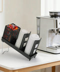 Go To Heavy Duty Coffee Cup Dispenser With Straws Holder And Lid Organizer For Countertop next to coffee machine.