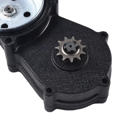 Close-up of 49Cc 4 Stroke Gearbox With Double Chain Clutch Drive, featuring aluminum alloy and steel construction.