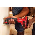 Cordless Oscillating Tool Kit With Blades, Sandpaper, Battery And Charger Included used on wall, red V20 system tool for DIY projects