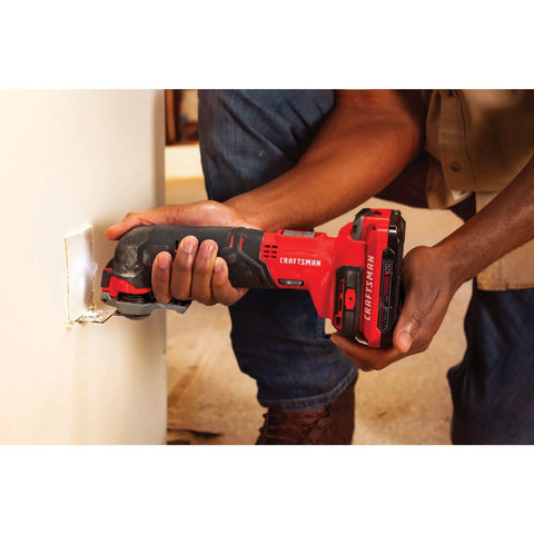 Cordless Oscillating Tool Kit With Blades, Sandpaper, Battery And Charger Included used on wall, red V20 system tool for DIY projects