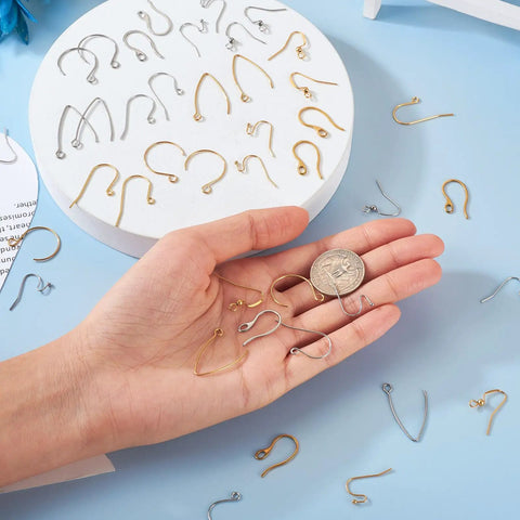 Hand holding 96Pcs Stainless Steel Earring Hooks Set Long V Shape Marquise Ear Wires With Circle Ball Dots And Horizontal Loops