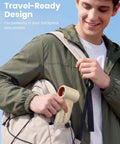 Man placing 10000mAh Portable Handheld Fan With USB Rechargeable Power Dope Mini Turbo Breeze into backpack pocket