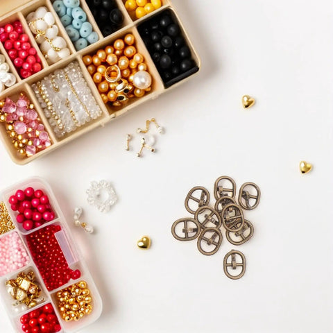 Miniature Alloy Buckle Set With 150 Pieces Silver Single Prong Fasteners surrounded by colorful beads and craft supplies