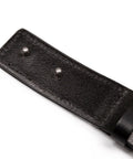 Close-up of black full-grain leather strap with metal pins from Scratchless Hidden Buckle Leather Work Belt For Tradesmen.