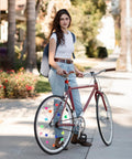 210 Glow In The Dark Bike Spoke Beads Set Colorful Plastic Spoke Clips For Bicycle Wheels Assorted Color Decorations And Noise Makers For Christmas Rides shown on bicycle wheels outdoors.