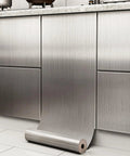 Stainless Steel Look Peel And Stick Contact Paper Silver Vinyl Wrap For Kitchen Appliances And Fridges Self Adhesive Wallpaper Easy To Install 17.7In Wide By 78.7In Long shown applied to kitchen cabinets