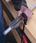 Using all metal handheld drill guide for straight holes with twenty five drill guides in one eighth to one half inch increments