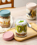 Six Pack 16 Oz Glass Jars With Airtight Lids For Overnight Oats, Snacks And Meal Prep, shown with layered yogurt and fruit
