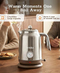 1.7L Large Electric Kettle With Thermometer, 1200W Fast Boil, Auto Shut Off, 304 Stainless Steel Coffee And Tea Kettle, Chrome Finish on a table.