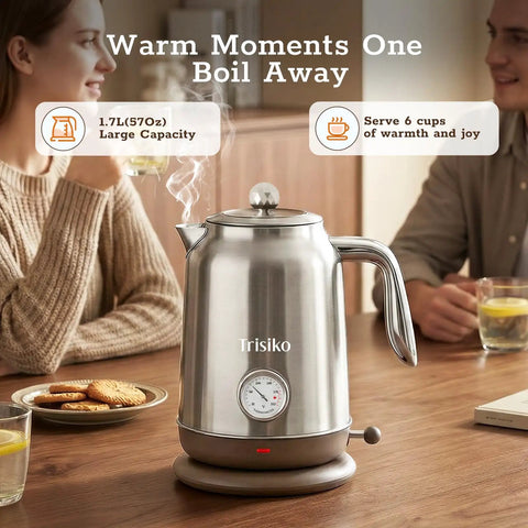 1.7L Large Electric Kettle With Thermometer, 1200W Fast Boil, Auto Shut Off, 304 Stainless Steel Coffee And Tea Kettle, Chrome Finish on a table.