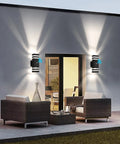 Night view of Dusk To Dawn Outdoor Light Fixture For Homes Square Exterior Wall Light Waterproof Modern LED Lighting illuminating patio.