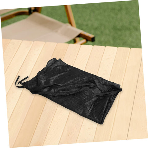 Folded black fabric of Trampoline Sun Shade Canopy Cover For Outdoor Backyards And Parks UV Protection Weather Resistant Top Replacement Easy Fold Trampoline Cover Keeps Kids Cool Safe Play Area Accessories on a wooden table