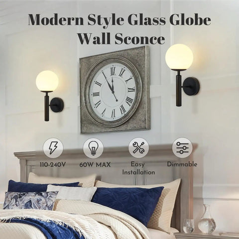 Set of 2 Dope Black Globe Wall Sconces with Milk Glass Shades above bed in bedroom with modern decor.