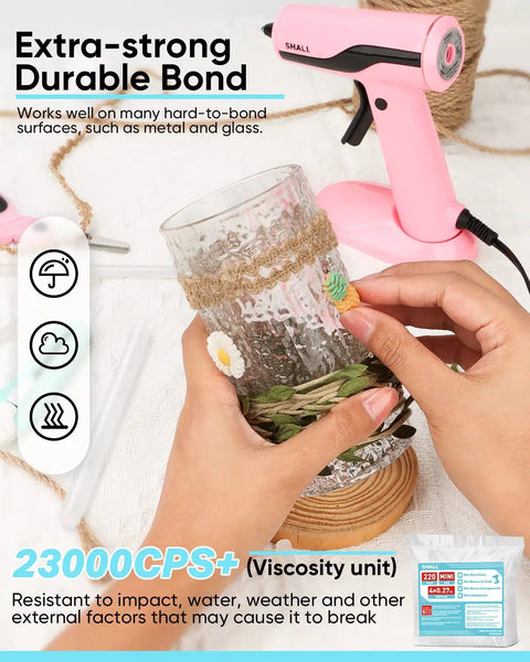 Woman applying Mini Hot Glue Sticks 0.27 Inch Diameter 4 Inch Length 220 Pack Clear All Temp to glass cup with pink mini glue gun