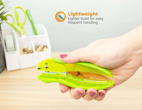 Hand holding green EZ Squeeze Reduced Effort One Hole Punch For The Office With No Jam Technology Ergonomic Grip in office setting.