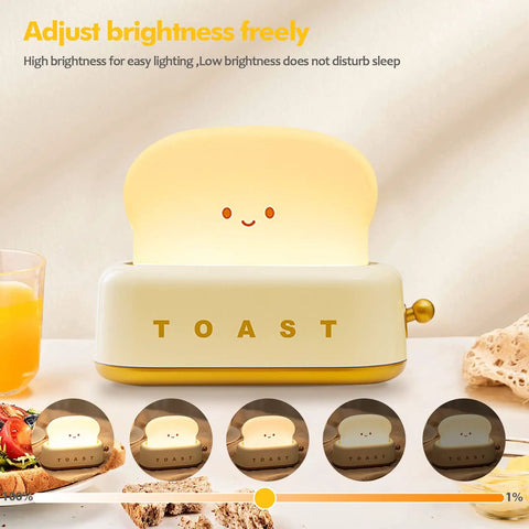 Toaster Shaped LED Table Lamp With Rechargeable Battery Nightstand Light With Timer Cute Toast Bread Bedroom Lamp For Kids Babies Boys And Girls Cozy Ambient Glow And Great Birthday Gift. Lamp adjusts brightness freely with a smiling toast design.