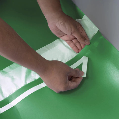 Applying overlapping seam tape on Top Shelf Premium Acoustical Underlayment Roll For Hardwood Floors 100 Square Foot.