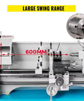Front view of mini metal lathe by Amazon; 600mm bed, 220mm height, tailstock, tool post, and chuck visible.