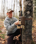Installation of Edge 3 Cellular Trail Camera Bundle 2 Pack With 40MP HD Photos 1080p Low Glow Flash GPS on a tree trunk