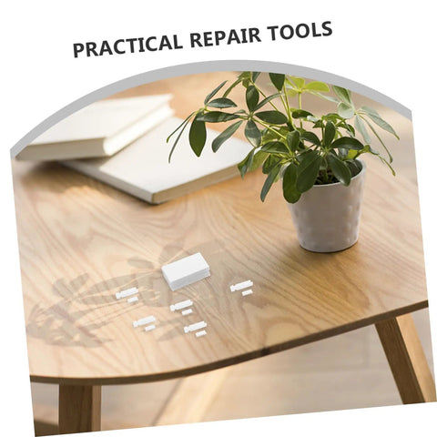 Vertical Blind Repair Kit 1 Set With Replacement Stems And Gears White on a wooden table with a plant and books.