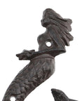 Hella Sturdy Mermaid Cast Iron Hooks, detailed view of rustic black mermaid design for wall plant hangers.