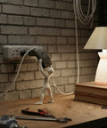 Workspace with lamp connected to a power strip using Two Pack Black Thumb Control Inline Power Button Switches For Lamps And Small Devices