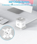 Super Slick Bedside Cube With Four AC Outlets And Three USB Ports ETL Certified Charging Station Power Strip in white on workspace.