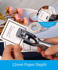 Go-To All Metal Single Hole Puncher With Lever punching cards, shows oval hole 0.59x0.16 inch, ideal for office, school, home, and craft projects