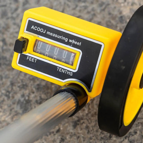 Close-up of Measuring Wheel with Adjustable Length, 0-9999m Capacity, featuring feet and tenths measurement display.