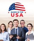 Group of smiling professionals under 'Based in the USA' emblem, holding digital devices, standing in front of wood panel wall.