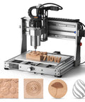 Genmitsu 3020-PRO Ultra CNC router with 710W spindle; all-metal frame, front view with carved wood samples.
