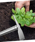 Gardener using Stainless Steel Garden Hoe For Weeding And Planting Handy All Purpose Hand Hoe Tool with basil plant in soil
