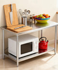 Heavy Duty Pro Grade Stainless Steel Kitchen Prep Table With Adjustable Undershelf, 36x24x33.5 inches, in a styled kitchen setting.