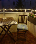 66 Ft 200 LED Fairy Lights With Plug In Switch Warm White Copper Wire String Lights Waterproof on a cozy balcony