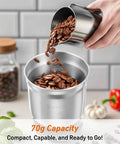 Pouring coffee beans into Electric Coffee And Spice Grinder with Dual Stainless Steel Blades and Removable Bowls Pulse Control