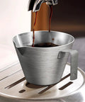 Stainless Steel Coffee Cup With Handle And V Shaped Mouth Shot Pitcher 120 Ml, coffee pouring into cup on espresso machine