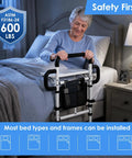 Senior using heavy duty bed rail for elderly safety with dual handles, adjustable to 600 lbs, non slip waterproof foam grip.