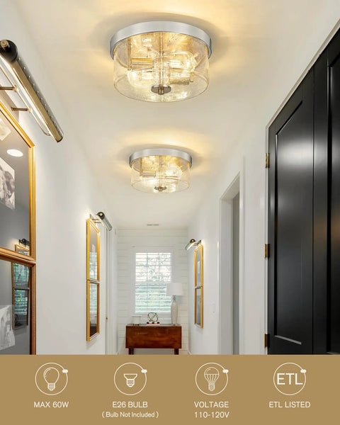 Matte Black two-light flush mount fixture with seeded glass shades in hallway, showcasing modern farmhouse style close to ceiling.
